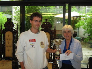 French FM Colomban Vitoux winner of the City of Dublin Chess Championships on a score of 5&frac12;/6 presented with hs prize by Independent Dublin Central T.D., Maureen O'Sullivan.
