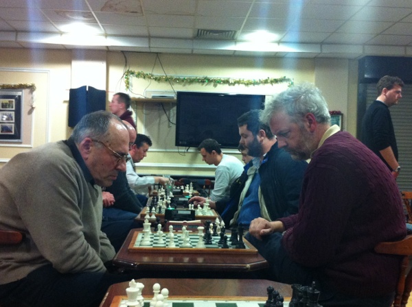 Melvin King of the Malahide Chess Club (left) joint winner of his section of the Blitz event in action against Ian Maloney